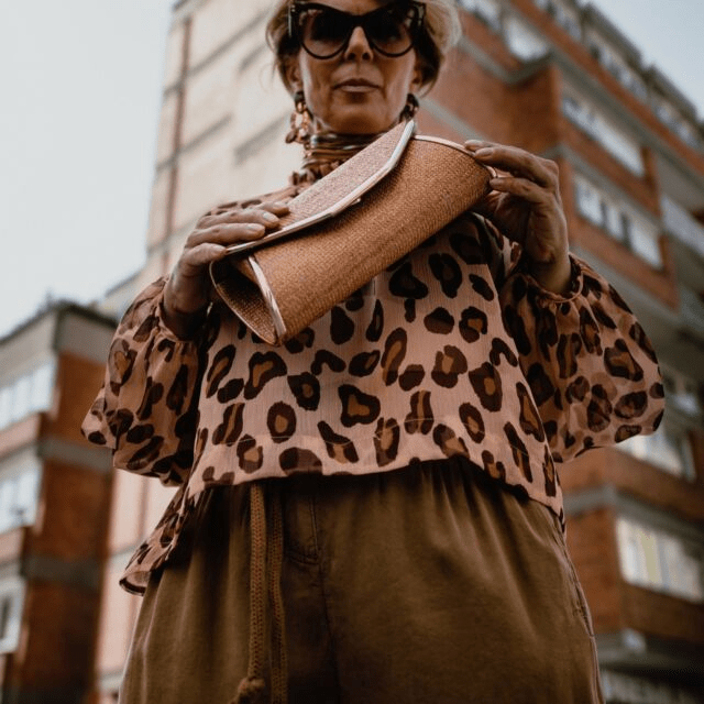 women wearing goggles standing with bag